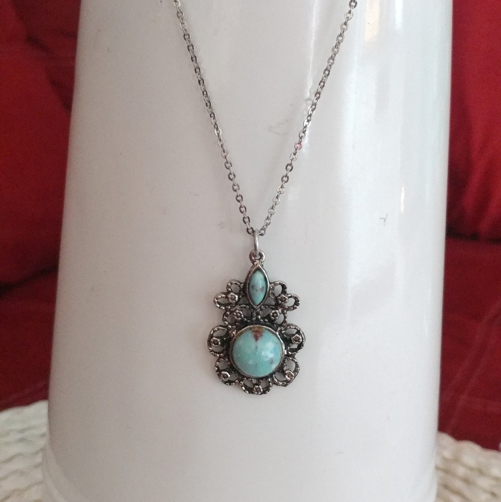 Silver necklace with turquoise pendant